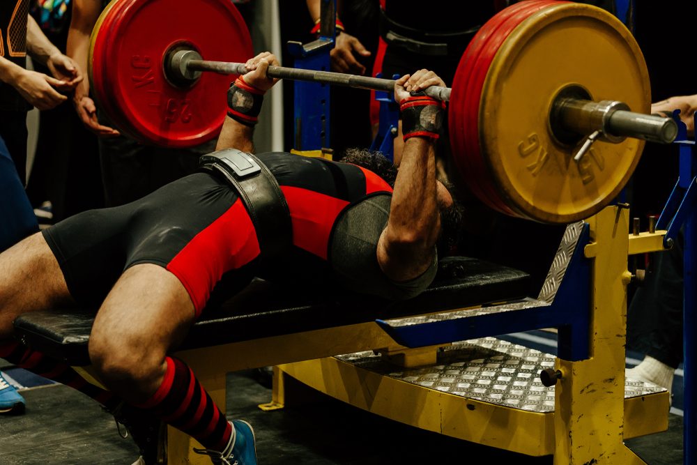 Lifter bench pressing a barbell