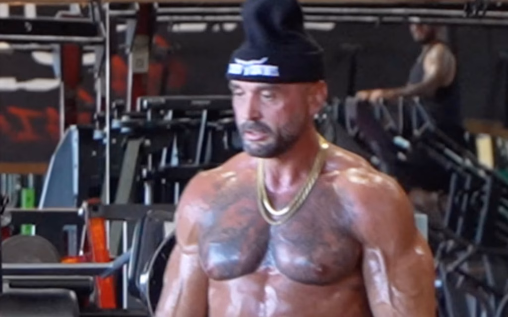A gym-goer attempting the deadlift challenge against Anatoly