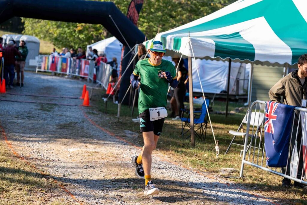 Phil Gore crosses the finish line at the Backyard Ultra World Championship