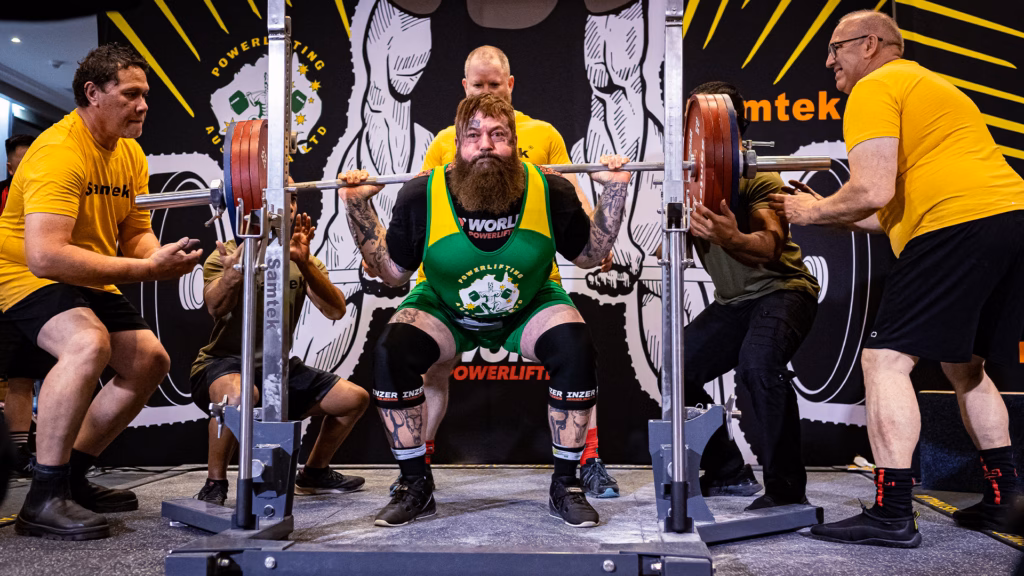A competitor lifting during a powerlifting competition